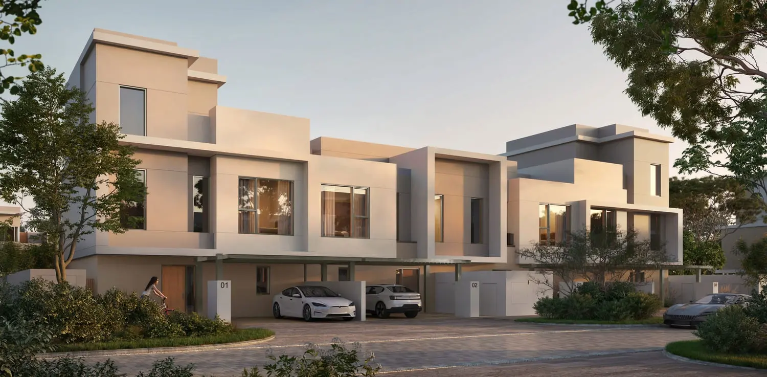 Townhouse streetscape with covered carports at Bayn by Ora, Ghantoot, between Abu Dhabi and Dubai
