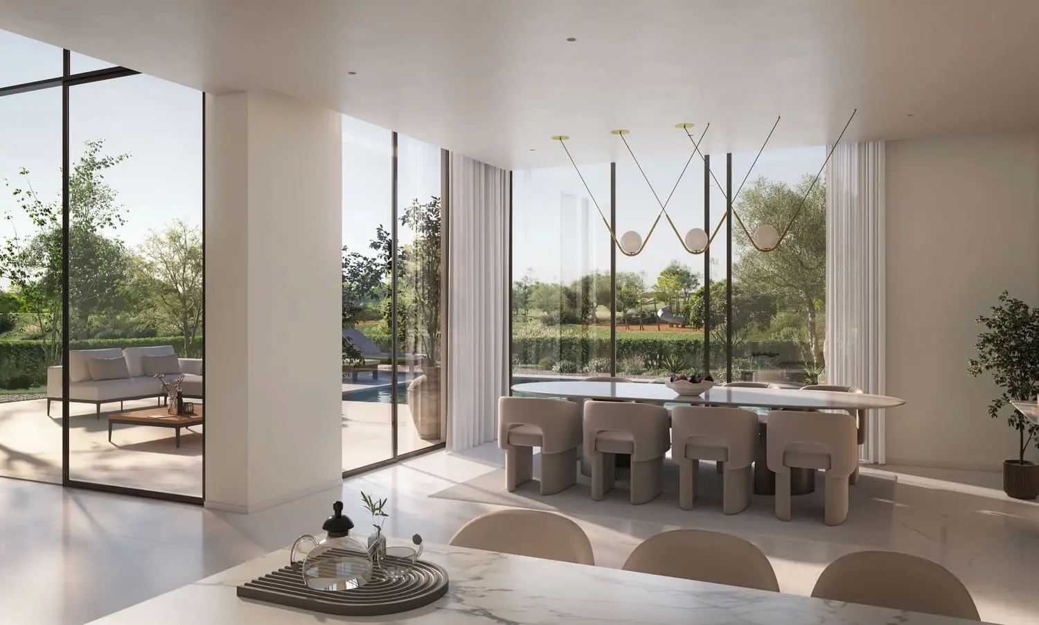 Dining area overlooking patio and private pool at Bayn by Ora, Ghantoot, between Abu Dhabi and Dubai