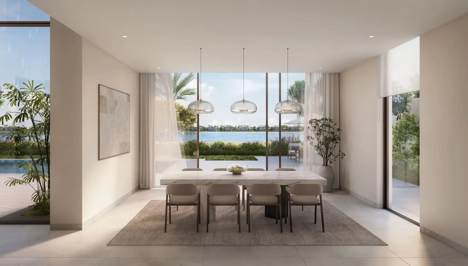 Dining room with panoramic waterfront outlook at Bayn by Ora, Ghantoot, between Abu Dhabi and Dubai