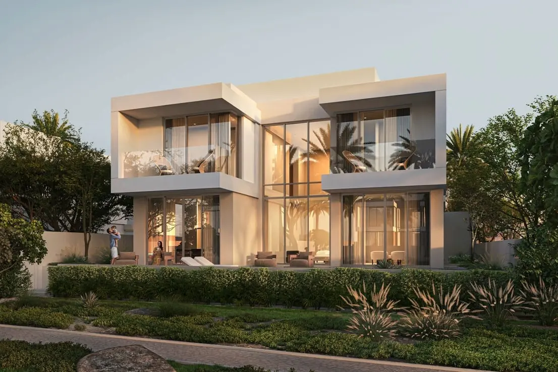 Glass atrium villa exterior with landscaped gardens at Bayn by Ora, Ghantoot, between Abu Dhabi and Dubai