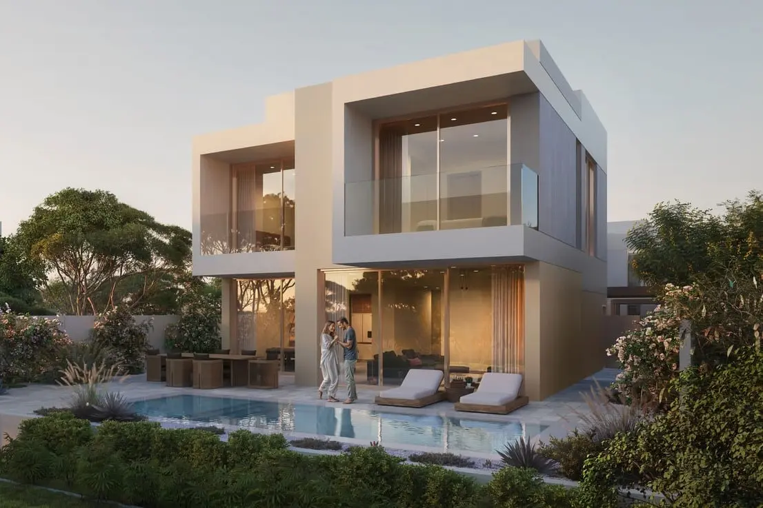 Villa pool patio lifestyle with couple at dusk at Bayn by Ora, Ghantoot, between Abu Dhabi and Dubai