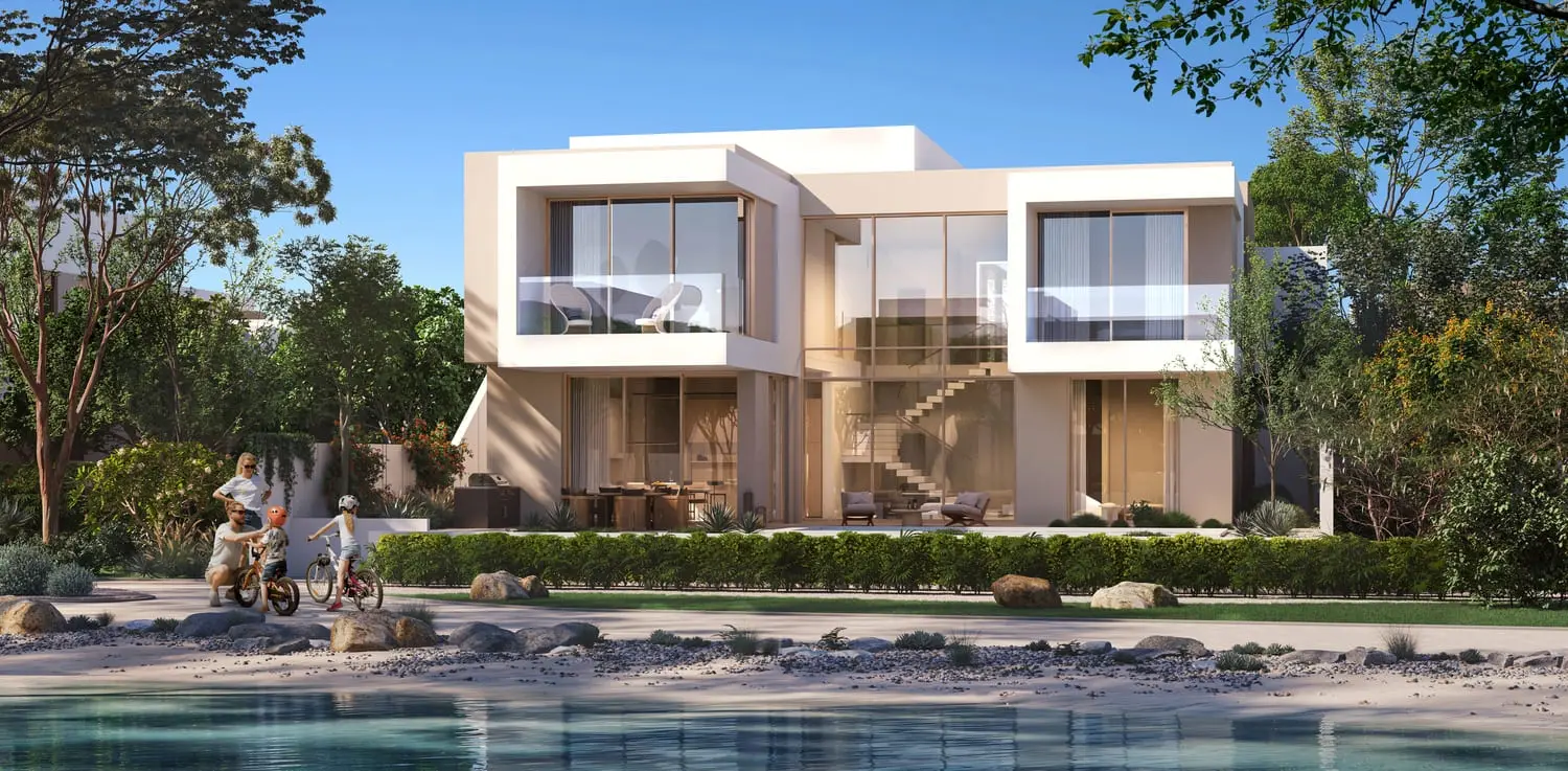 Waterfront villa exterior with family lifestyle by the lagoon at Bayn by Ora, Ghantoot, between Abu Dhabi and Dubai
