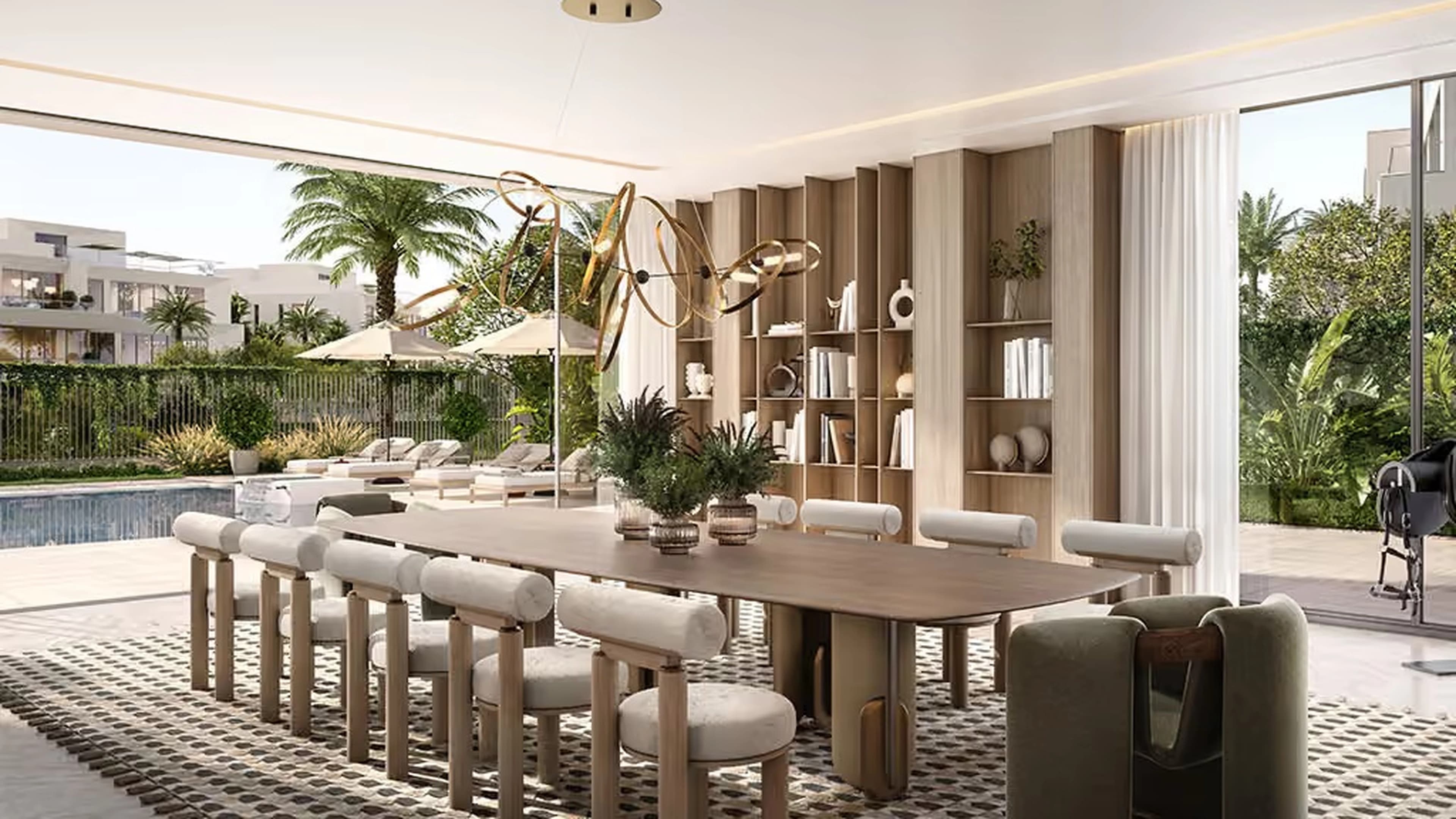 Mirage luxury dining room opening to pool and garden