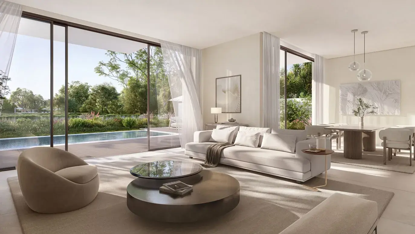 Open-plan living and dining with pool view at Y Views at Bayn, Ghantoot, between Abu Dhabi and Dubai