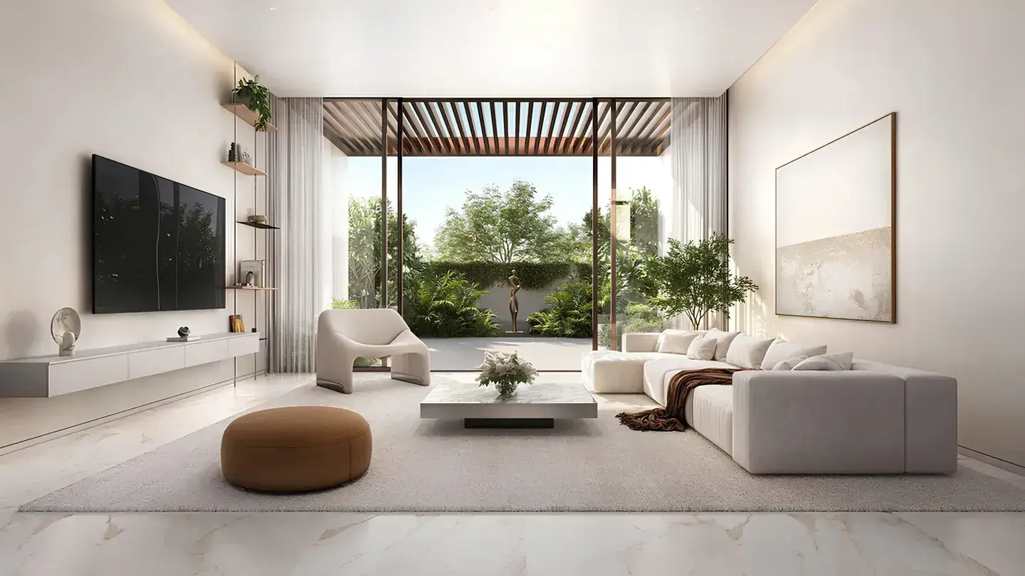 Living room opening to a landscaped garden terrace at Y Views at Bayn, Ghantoot, between Abu Dhabi and Dubai