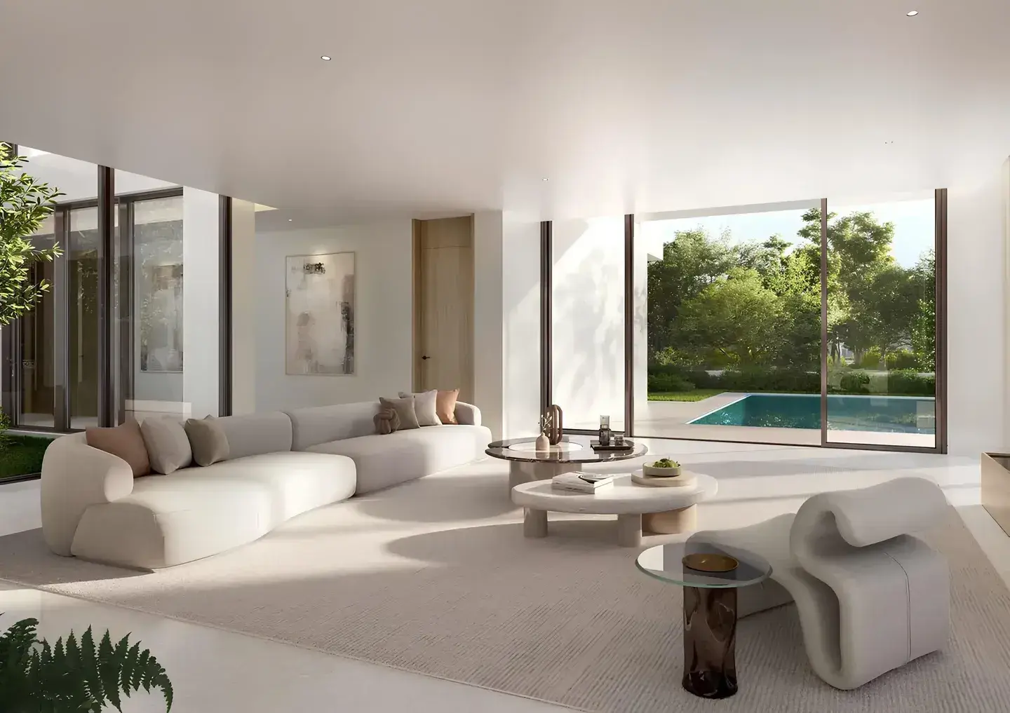 Living room looking out to a private pool at Y Views at Bayn, Ghantoot, between Abu Dhabi and Dubai