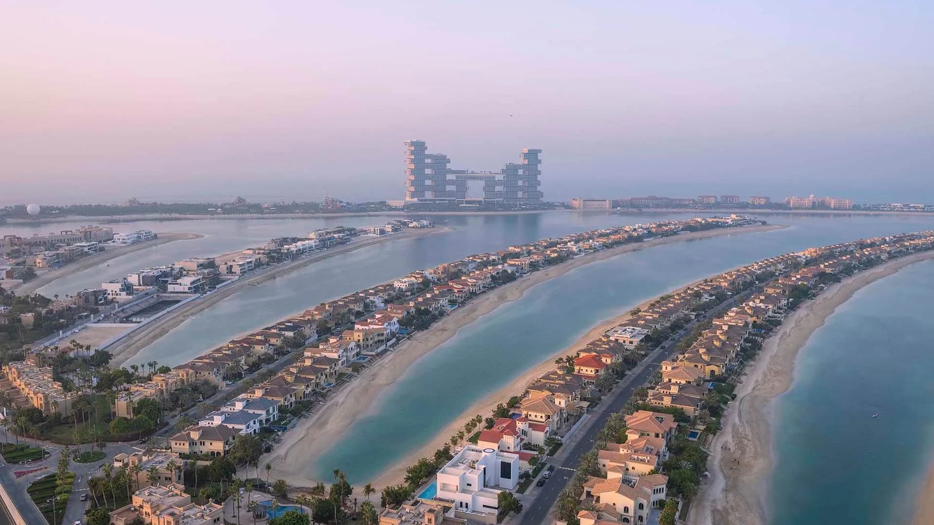 Reference image: Palm Jumeirah fronds and Atlantis by Nakheel — developer heritage, not Palm Springs
