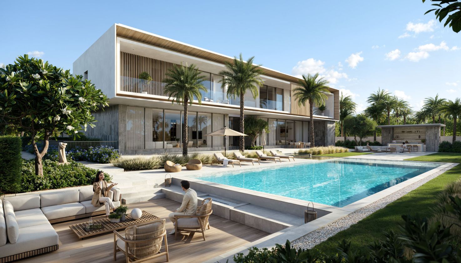Lavita mansion rear exterior with pool and outdoor kitchen