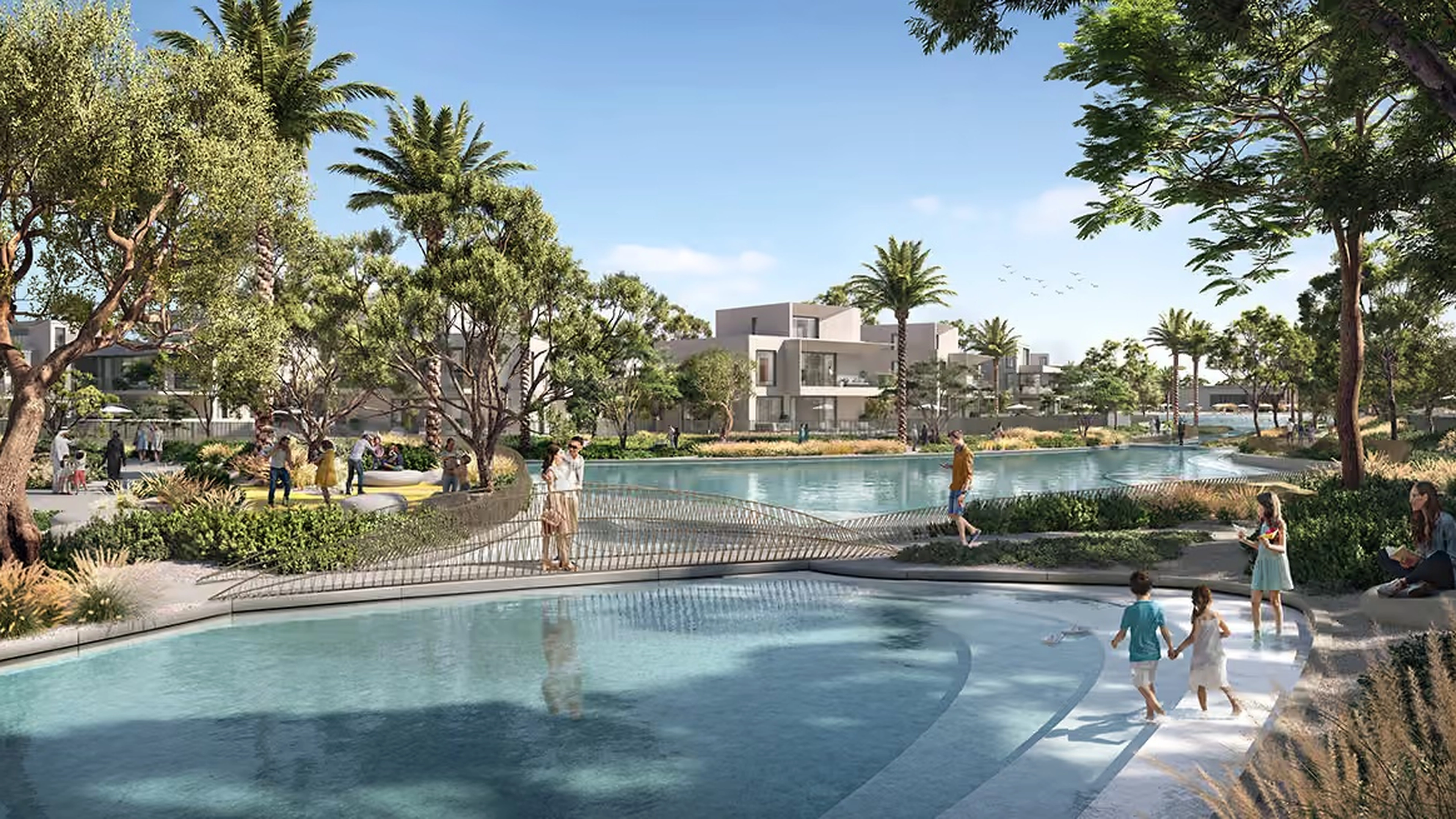 Mirage lagoon park and pedestrian bridge at The Oasis by Emaar